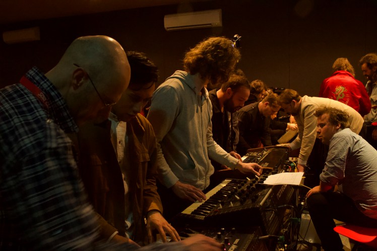 crowding around synths